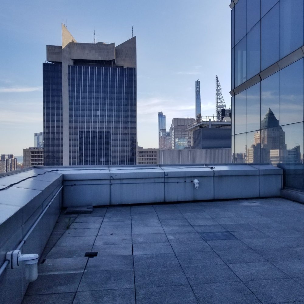 Roku roof before renovation, with a plain unused maintenance space