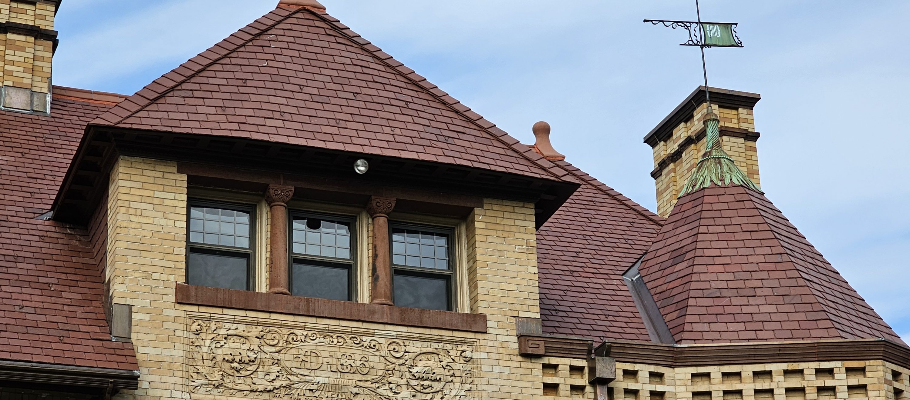 Historic slate roof and masonry facade