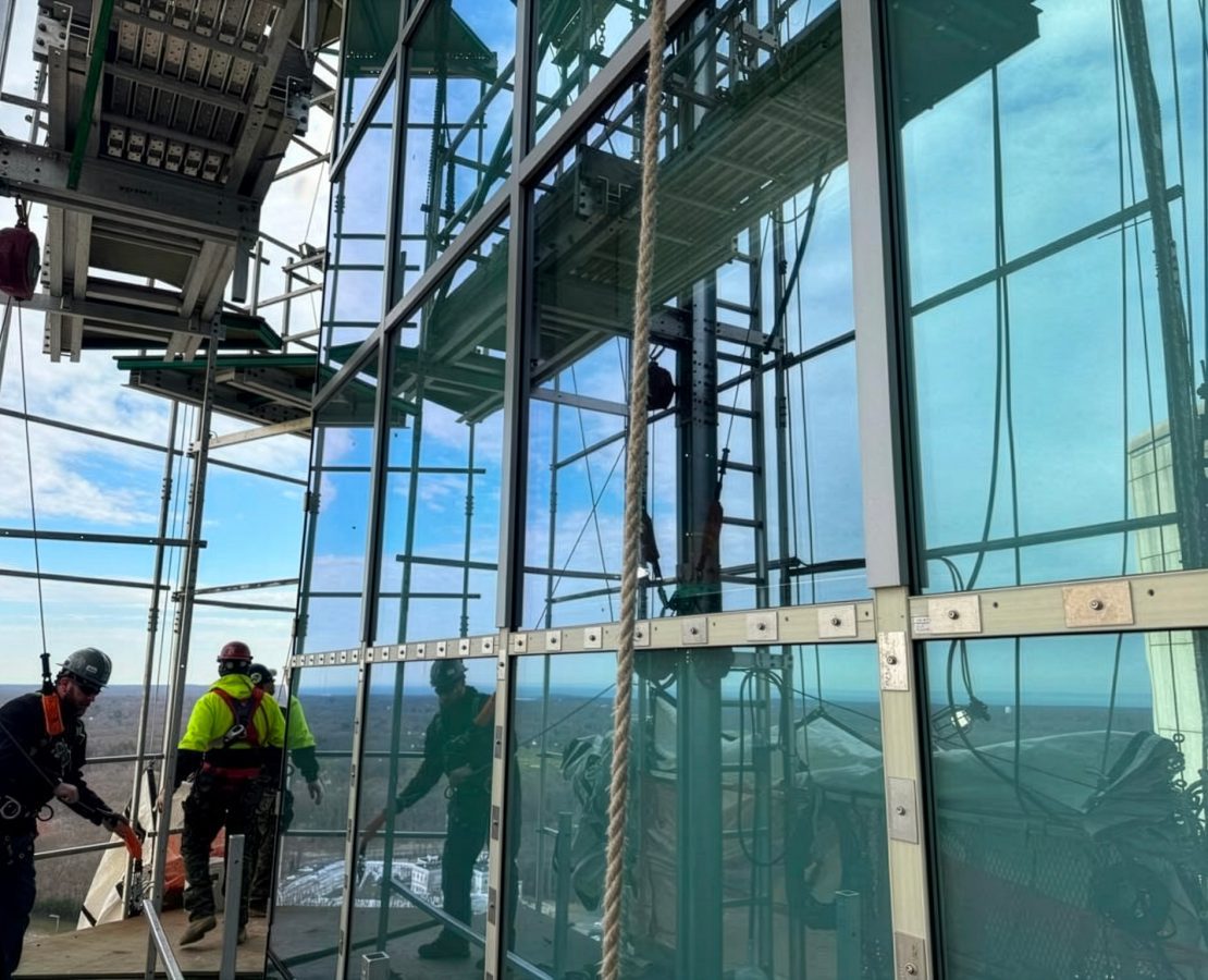 New glazed curtain wall installation at an existing facade.