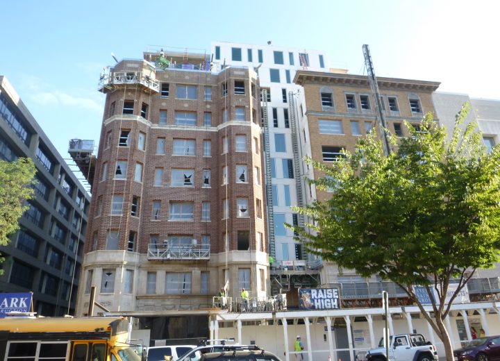 A university building undergoing facade rehabilitation