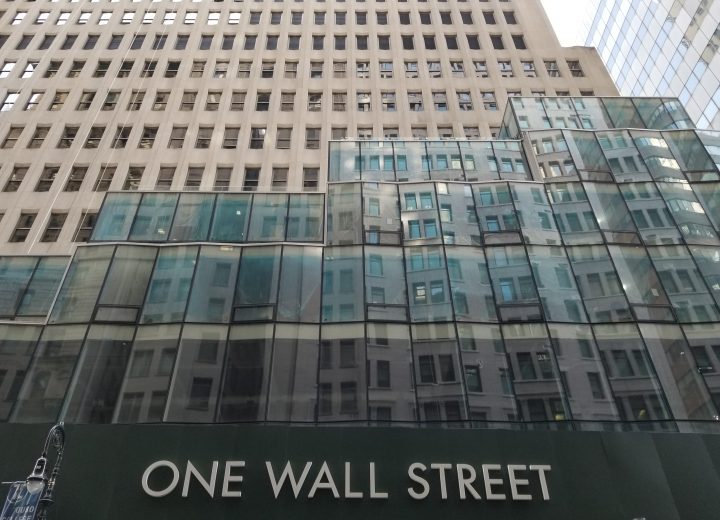 One Wall Street in New York, with view of new glass facade at lower floors