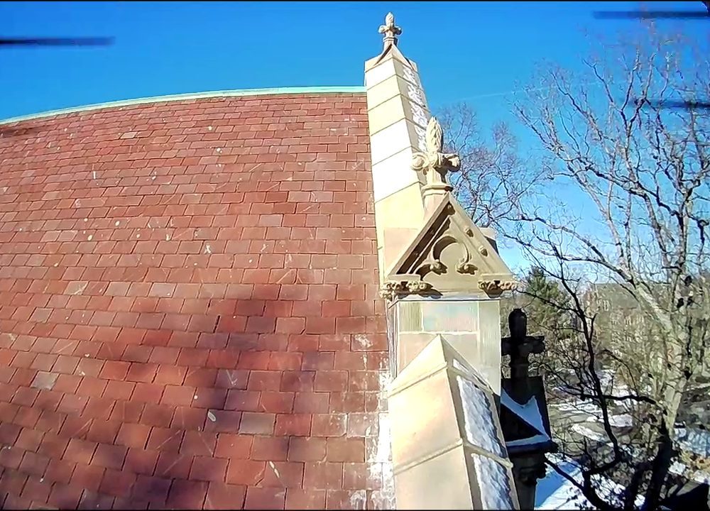 Aerial view of completed restoration at terra cotta gable, using synthetics and new terra cotta