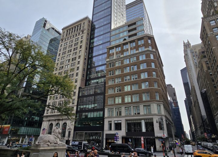 Street view of glass curtain wall residential tower in Manhattan