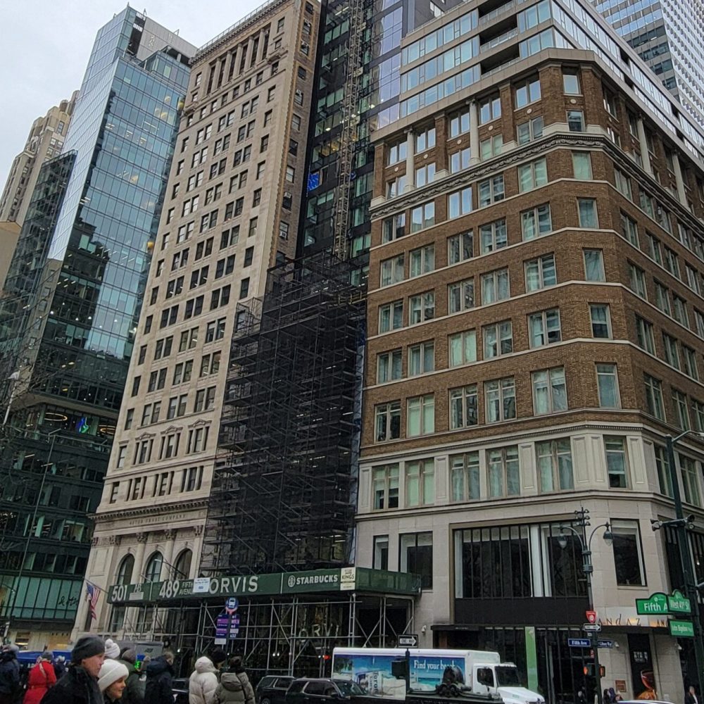Construction scaffolding and sidewalk bridging on a New York City street