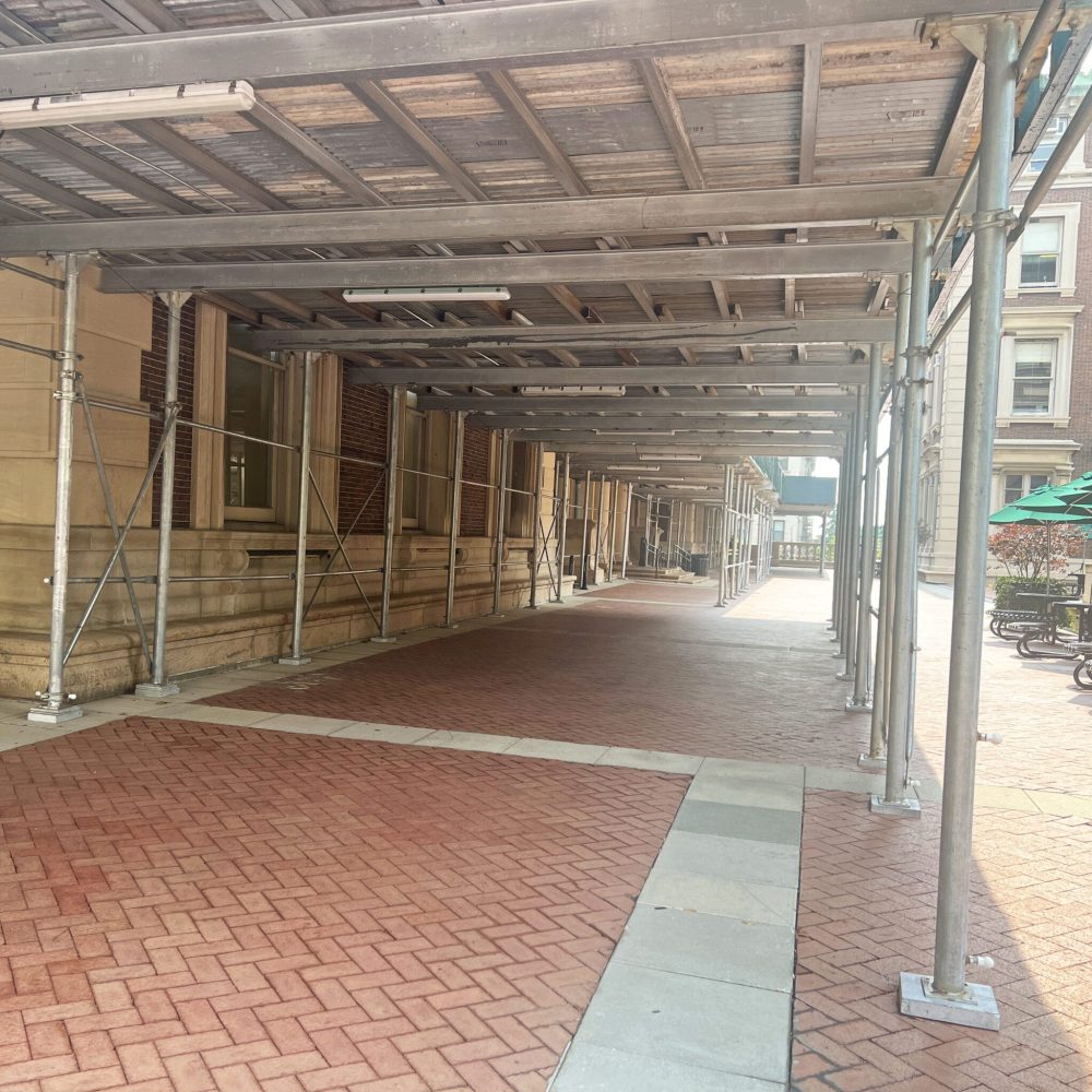 Sidewalk bridging shades a New York City plaza