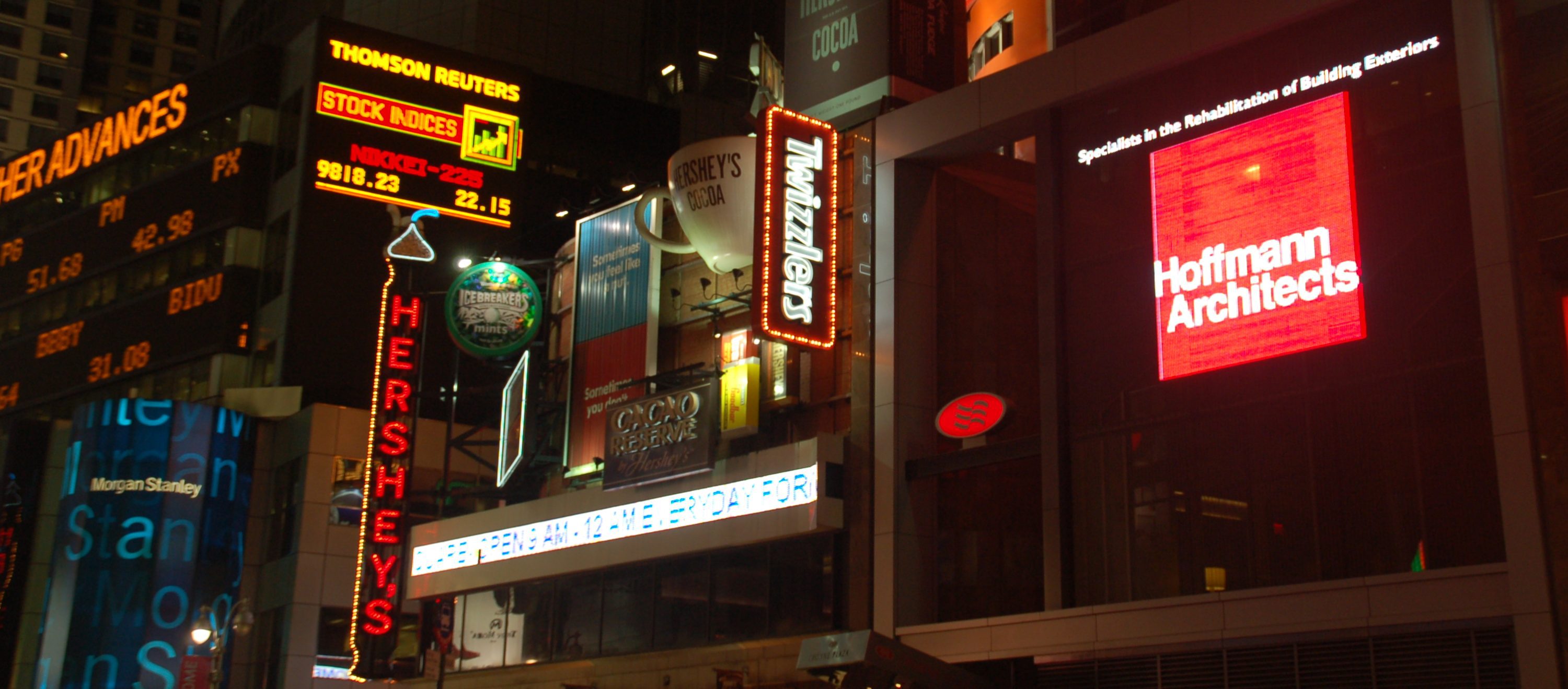 Crowne Plaza Times Square marquis at night with Hoffmann logo