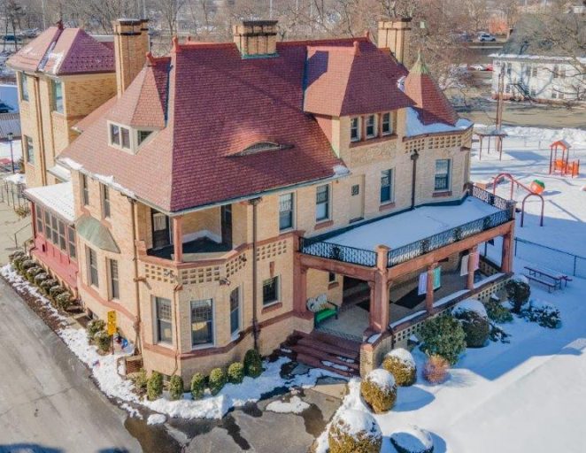 Historic Romanesque mansion and adjacent children's playground