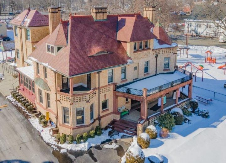 Historic Romanesque mansion and adjacent children's playground