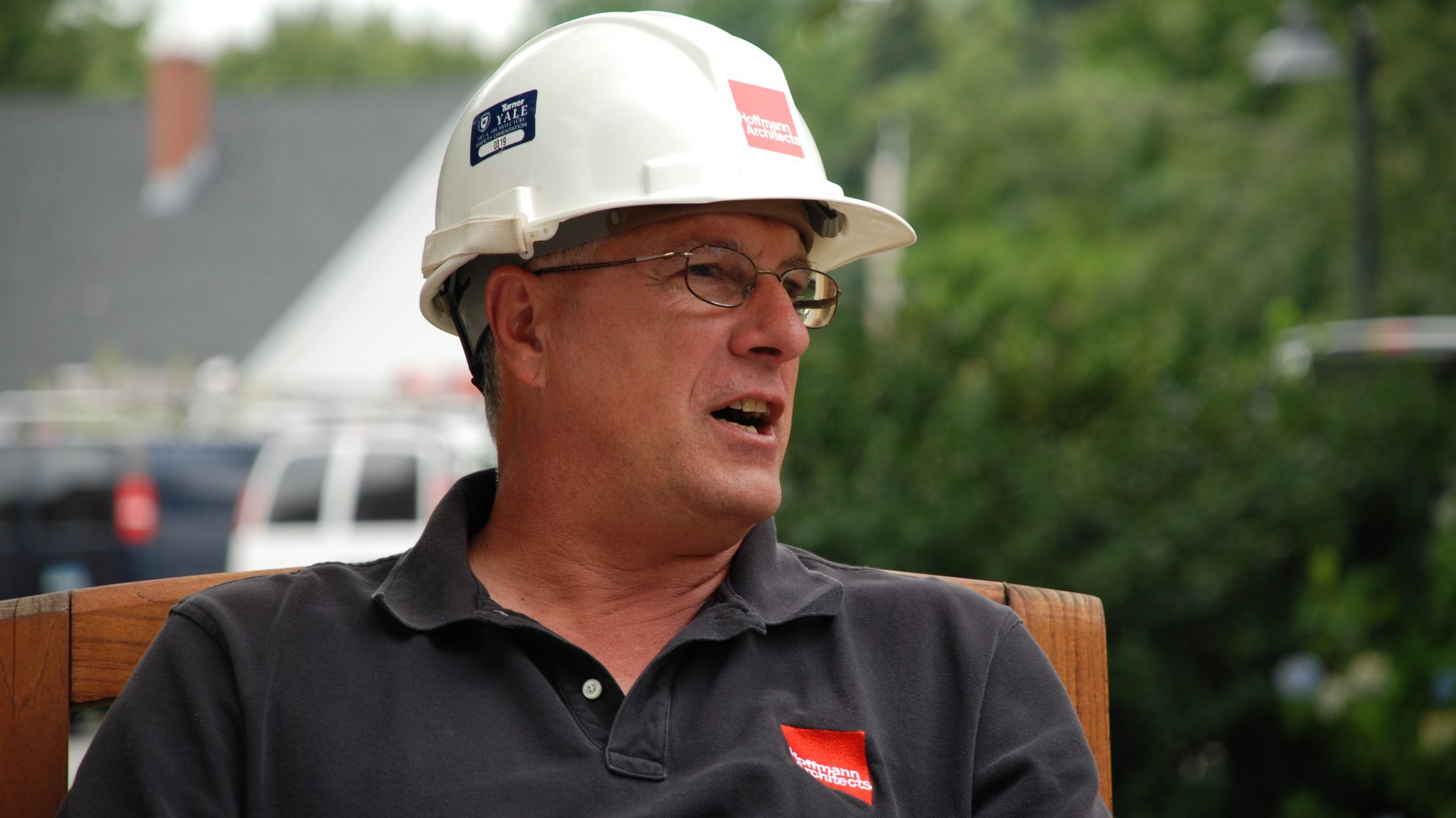 Architect Russell Sanders in a hard hat at a project site