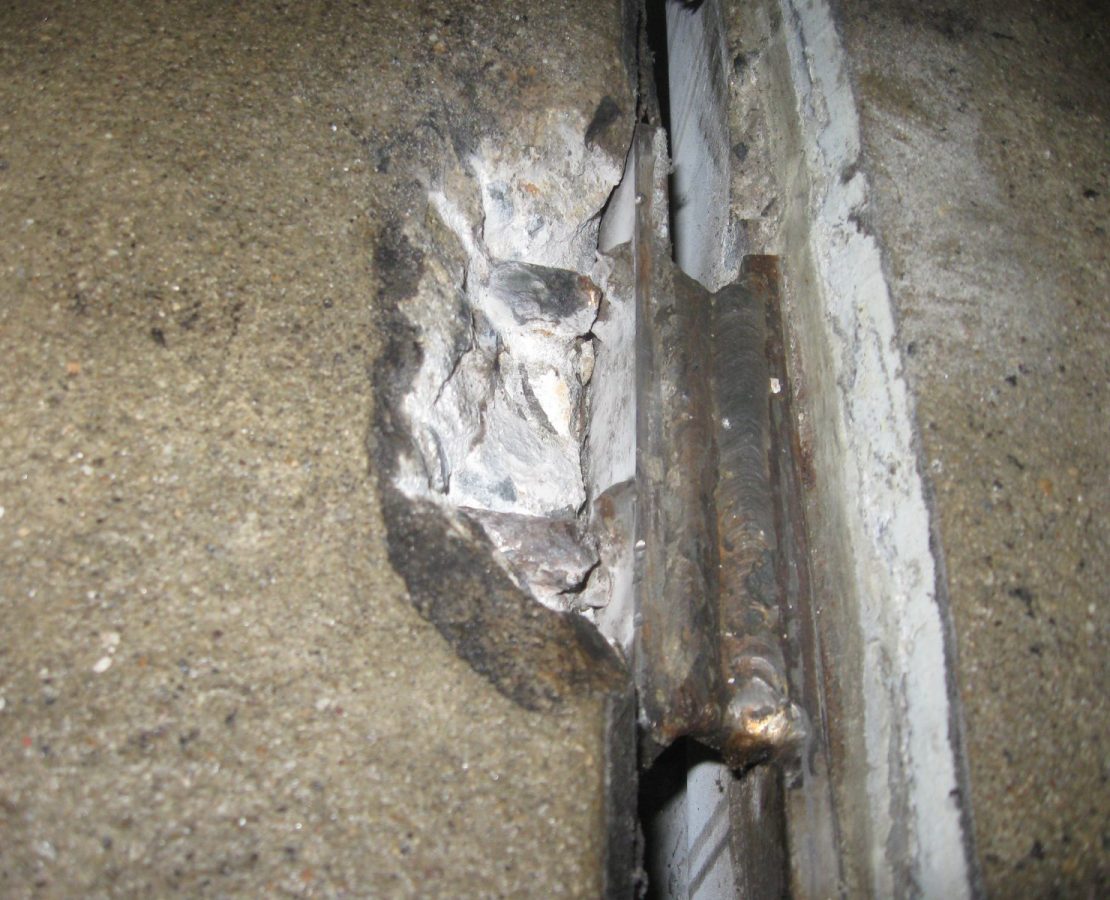 Fractured rebar at flange connection.
