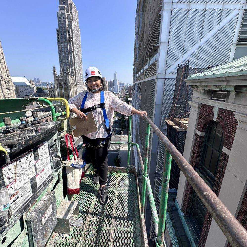 An architect atop a scaffold in New York City