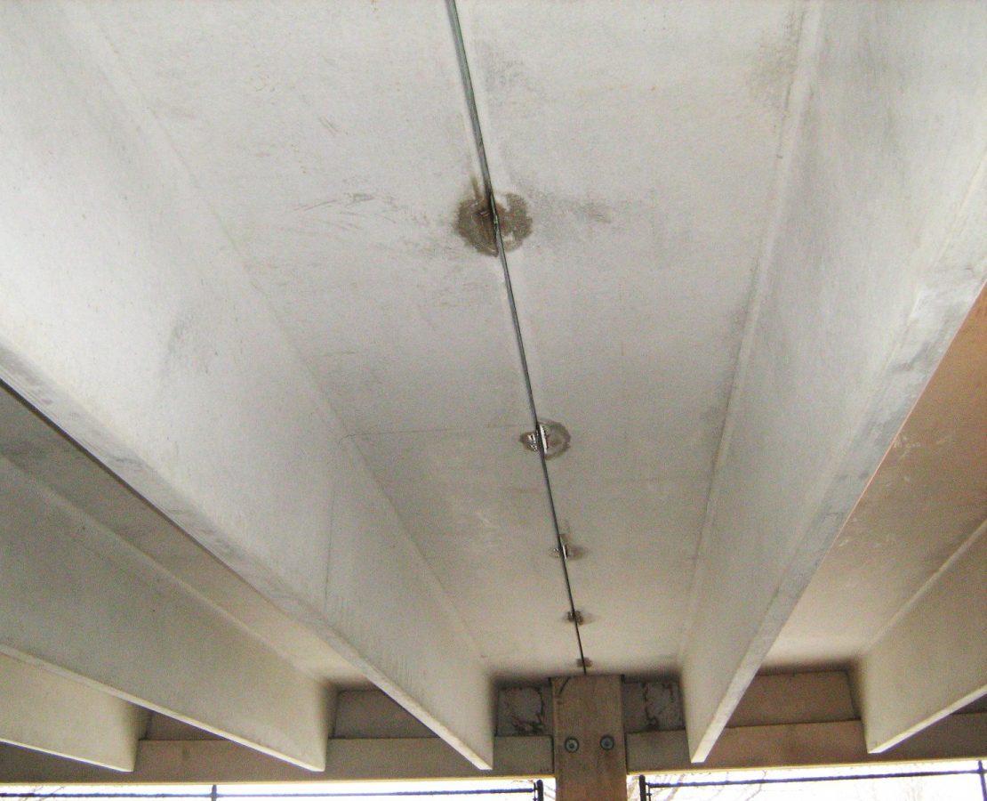 Leaks at connections in a parking garage due to welding.