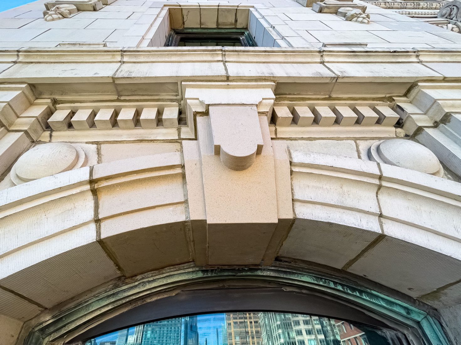 Typical terra cotta and cast composite polymer resin replacement blocks, mortar repointing, and repaired terra cotta