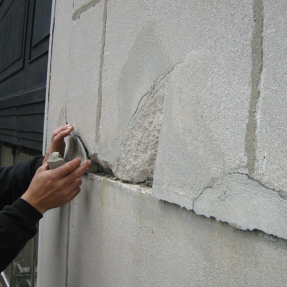 Philadelphia Office Tower spalled concrete removed by hand