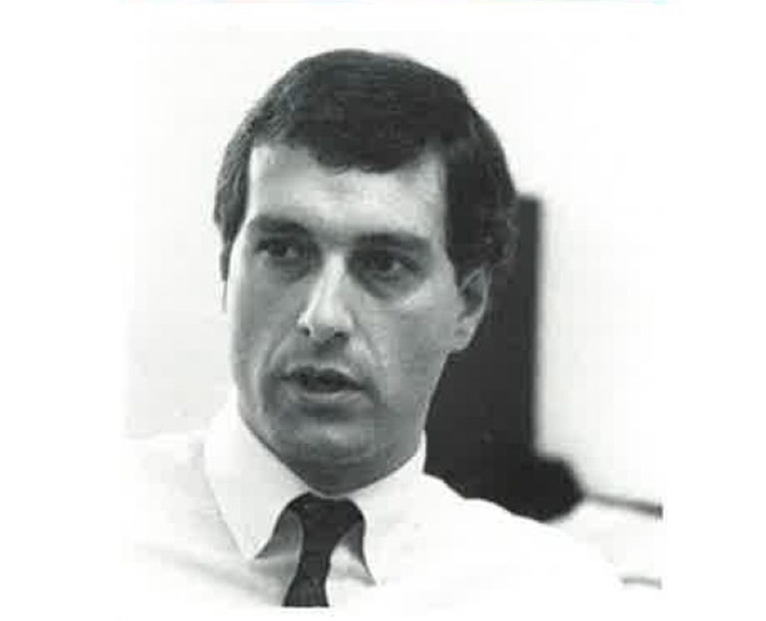Russell Sanders headshot from 1990 issue of the Hoffmann Architects Journal